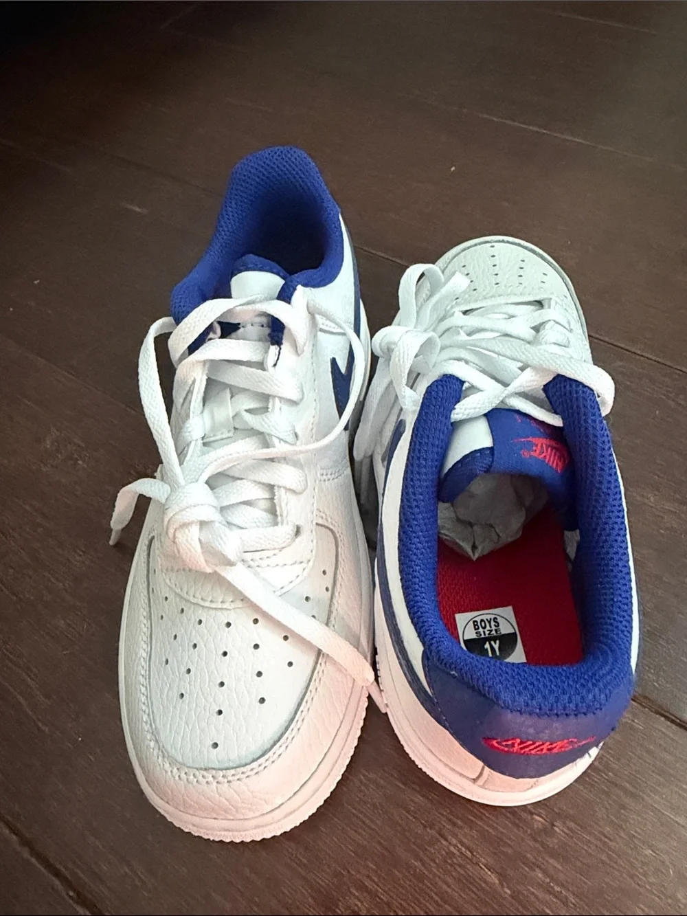 Nike Kids White Sneakers with Blue Swoosh